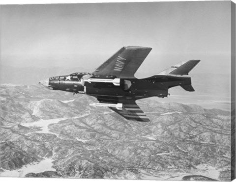 Framed Side profile of a fighter plane carrying sidewinder missiles during flight, F9F-8 Cougar, US Navy Print