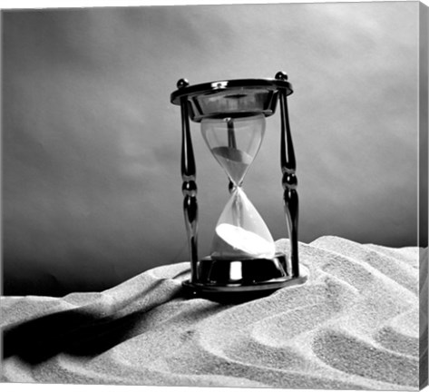 Framed Close up of hourglass on sand Print