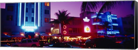 Framed Hotel lit up at night, Miami, Florida, USA Print