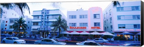 Framed Traffic on road in front of hotels, Ocean Drive, Miami, Florida, USA Print