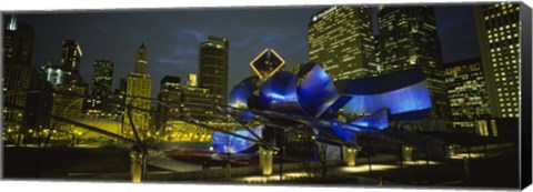 Framed Low angle view of buildings lit up at night, Pritzker Pavilion, Millennium Park, Chicago, Illinois, USA Print