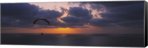 Framed Silhouette of a person paragliding over the sea, Blacks Beach, San Diego, California, USA Print