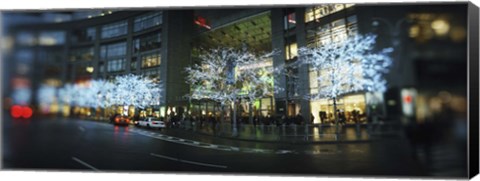 Framed Buildings lit up at the roadside, Columbus Circle, New York City, New York State, USA Print