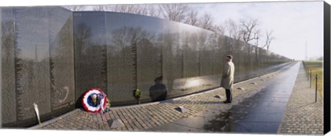 Framed Side profile of a person standing in front of a war memorial, Vietnam Veterans Memorial, Washington DC, USA Print