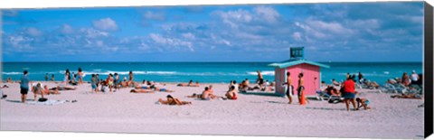 Framed Tourist on the beach, Miami, Florida, USA Print