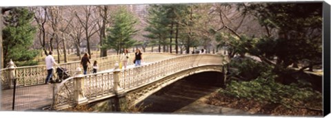 Framed Group of people walking on an arch bridge, Central Park, Manhattan, New York City, New York State, USA Print