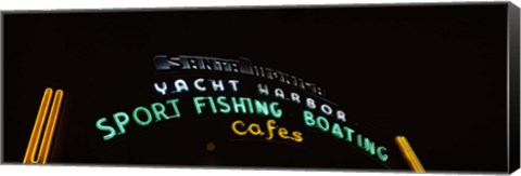 Framed Low angle view of a neon signboard, Santa Monica Pier, Santa Monica, Los Angeles County, California, USA Print