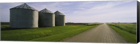 Framed Three silos in a field Print