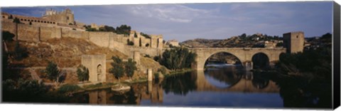 Framed Castle at the waterfront, Puente de San Martin, Tajo River, Toledo, Spain Print