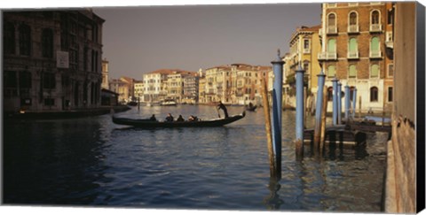 Framed Tourists sitting in a gondola, Grand Canal, Venice, Italy Print