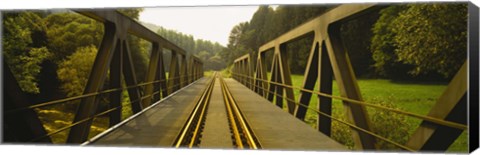 Framed Railroad tracks passing through a bridge, Germany Print