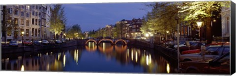 Framed Night View Along Canal Amsterdam The Netherlands Print