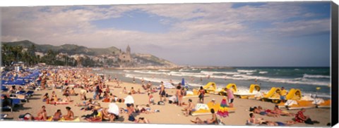 Framed Tourists on the beach, Sitges, Spain Print