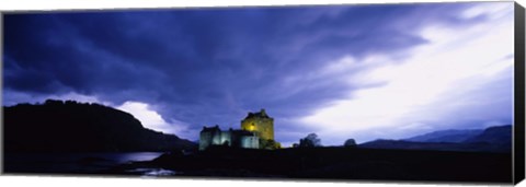 Framed Low Angle View Of A Castle Lit Up At Dusk, Eilean Donan Castle, Highlands, Scotland, United Kingdom Print