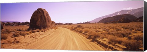 Framed Dirt road passing through an arid landscape, Californian Sierra Nevada, California, USA Print