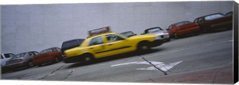 Framed Taxi running on the road, San Francisco, California, USA Print