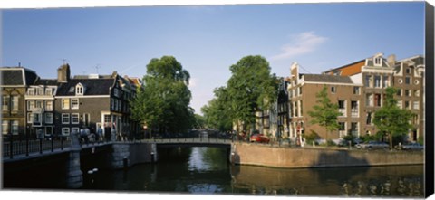 Framed Bridge across a canal, Amsterdam, Netherlands Print