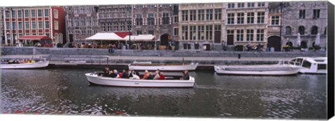 Framed High angle view of tourboats in a river, Leie River, Graslei, Ghent, Belgium Print