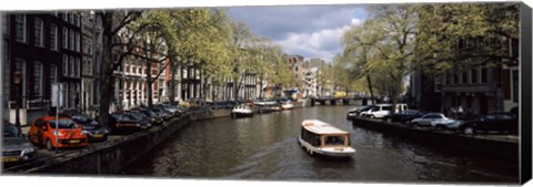 Framed Close up of Boats in a canal, Amsterdam, Netherlands Print