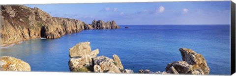 Framed Rock formations at seaside, Logan rock, Porthcurno Bay, Cornwall, England Print