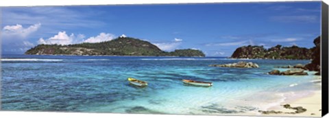 Framed Small fishing boats on Anse L&#39;Islette with Therese Island in background, Seychelles Print