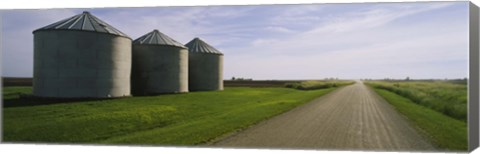 Framed Three silos in a field Print