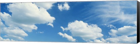 Framed Clouds against a pale blue sky Print