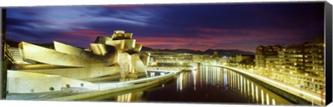 Framed Buildings lit up at dusk, Guggenheim Museum Bilbao, Bilbao, Vizcaya, Spain Print