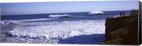 Framed Tourist looking at waves in the sea, Santa Cruz, Santa Cruz County, California, USA Print