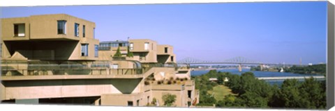 Framed Housing complex with a bridge in the background, Habitat 67, Jacques Cartier Bridge, Montreal, Quebec, Canada Print