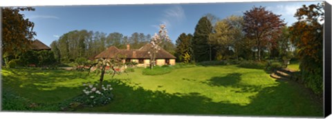 Framed Millstream cottages, Egerton, Kent, England Print