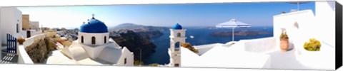 Framed Rooftop view of buildings at the waterfront, Santorini, Greece Print