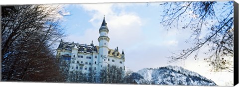 Framed Low angle view of the Neuschwanstein Castle in winter, Bavaria, Germany Print