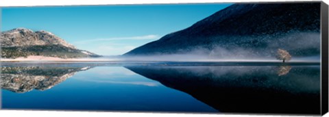 Framed Reflection of a mountain with snowy trees on a lake in winter afternoon, Cote d&#39;Azur, France Print