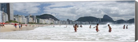 Framed People enjoying on Copacabana Beach with Sugarloaf Mountain in background, Rio De Janeiro, Brazil Print