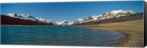 Framed Lake with snow covered mountains in the background, Sherburne Lake, US Glacier National Park, Montana, USA Print