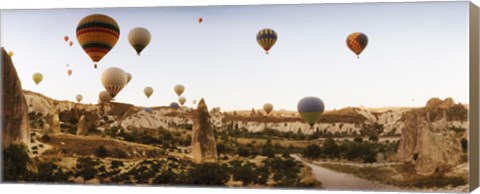 Framed Hot air balloons over landscape at sunrise, Cappadocia, Central Anatolia Region, Turkey Print