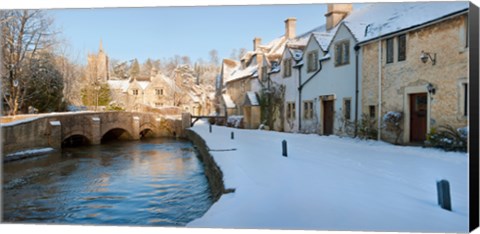 Framed Buildings along snow covered street, Castle Combe, Wiltshire, England Print