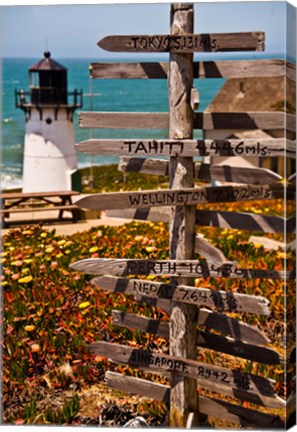 Framed Directional signs on a pole with light house in the background, Point Montara Lighthouse, Montara, California, USA Print