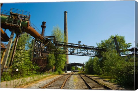 Framed Railroad tracks passing through an old steel mill, North Duisburg Landscape Park, Ruhr, North Rhine Westphalia, Germany Print