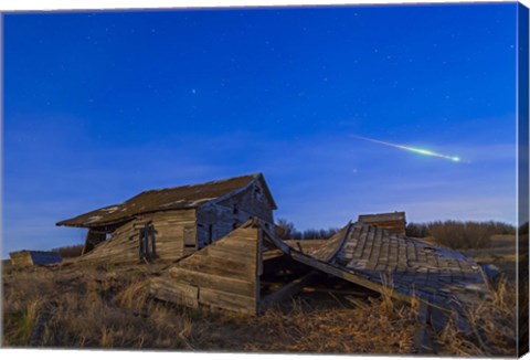 Framed bright bolide meteor breaking up as it enters the atmosphere Print