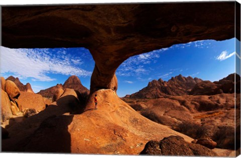 Framed Boy under natural rock arch at Spitzkoppe, Namibia Print