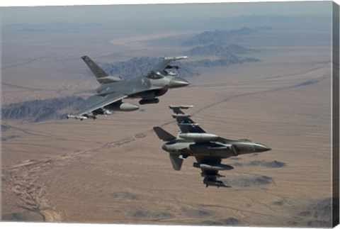 Framed Two F-16&#39;s on a training mission over the Arizona desert Print