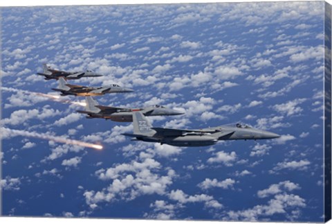 Framed Four F-15 Eagles fly in Formation Over the Pacific Ocean Print