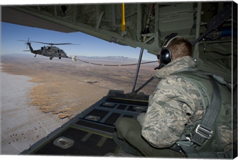 Framed Loadmaster on an HC-130 Watches a HH-60G Pave Hawk Refuel Print