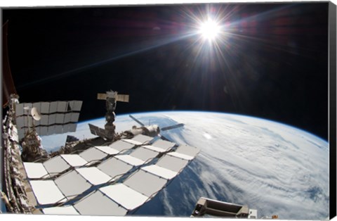 Framed Bright Sun, a Portion of the International Space Station and Earth&#39;s horizon Print