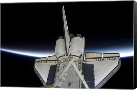 Framed Space Shuttle Discovery Intersecting the Thin line of Earth&#39;s Atmosphere, while Docked with the International Space Station Print