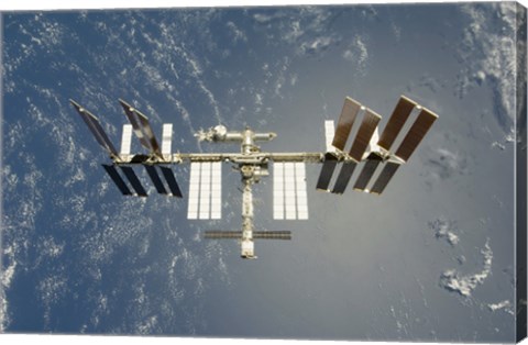 Framed International Space Station Backdropped against Earth Print