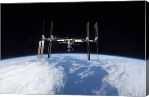 Framed International Space Station backdropped by Earth&#39;s Horizon Print