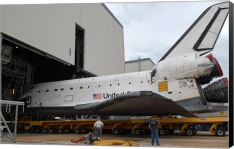 Framed Space Shuttle Atlantis Rolls out of Orbiter Processing Facility 1 at Kennedy Space Center Print